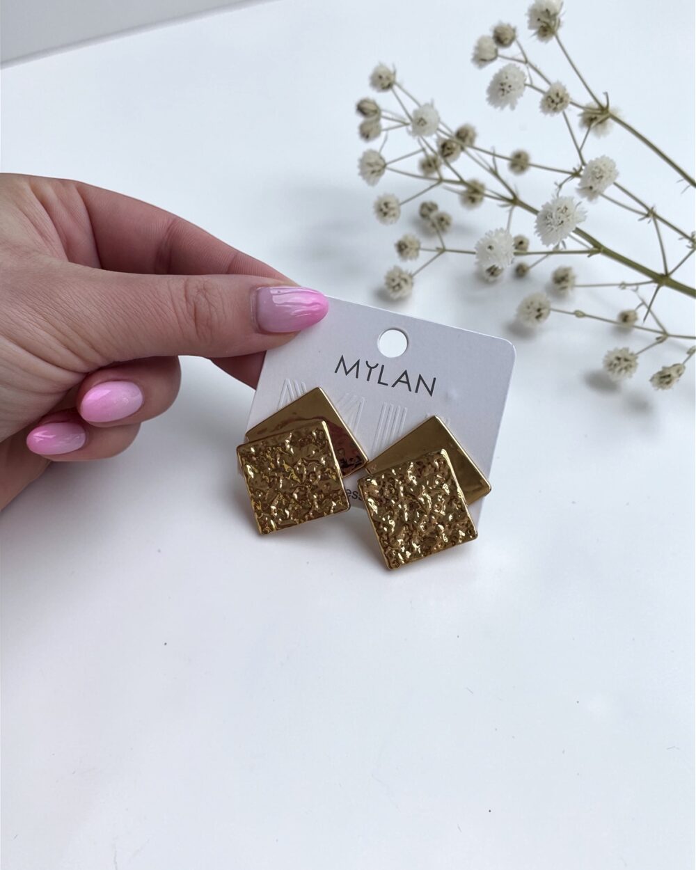 Eleganckie kolczyki ze stali- romby